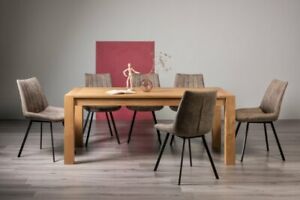  
Blake Light Oak 8-10 Seater Dining Table & 8 Fontana Tan Faux Suede Fabric Chair